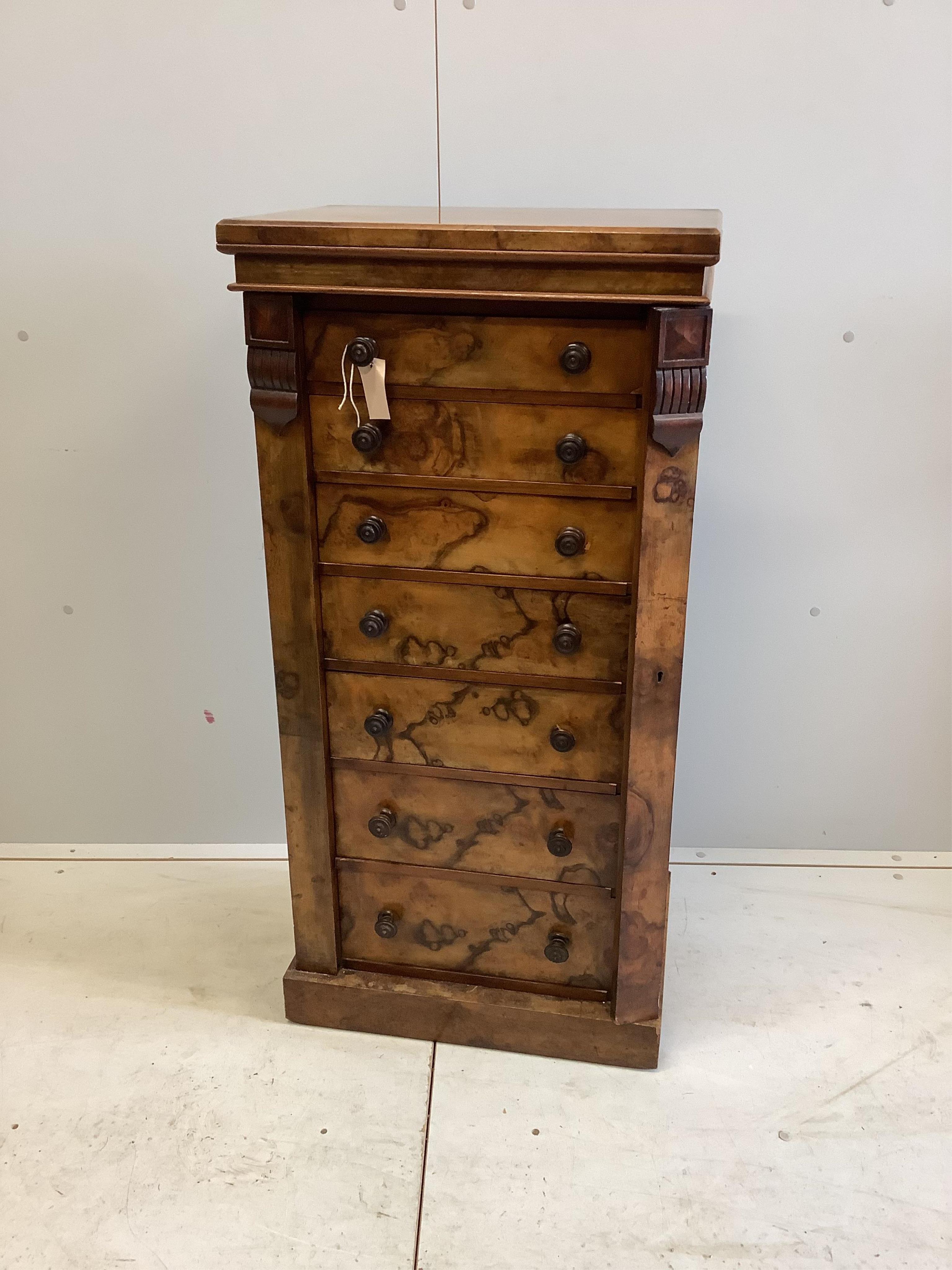 A Victorian walnut Wellington chest, width 52cm, depth 37cm, height 108cm. Condition - fair to good